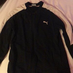 This is a black puma jacket.